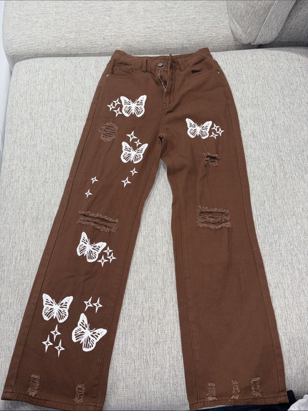 SHEIN Brown Distressed Jeans with White Butterfly Print